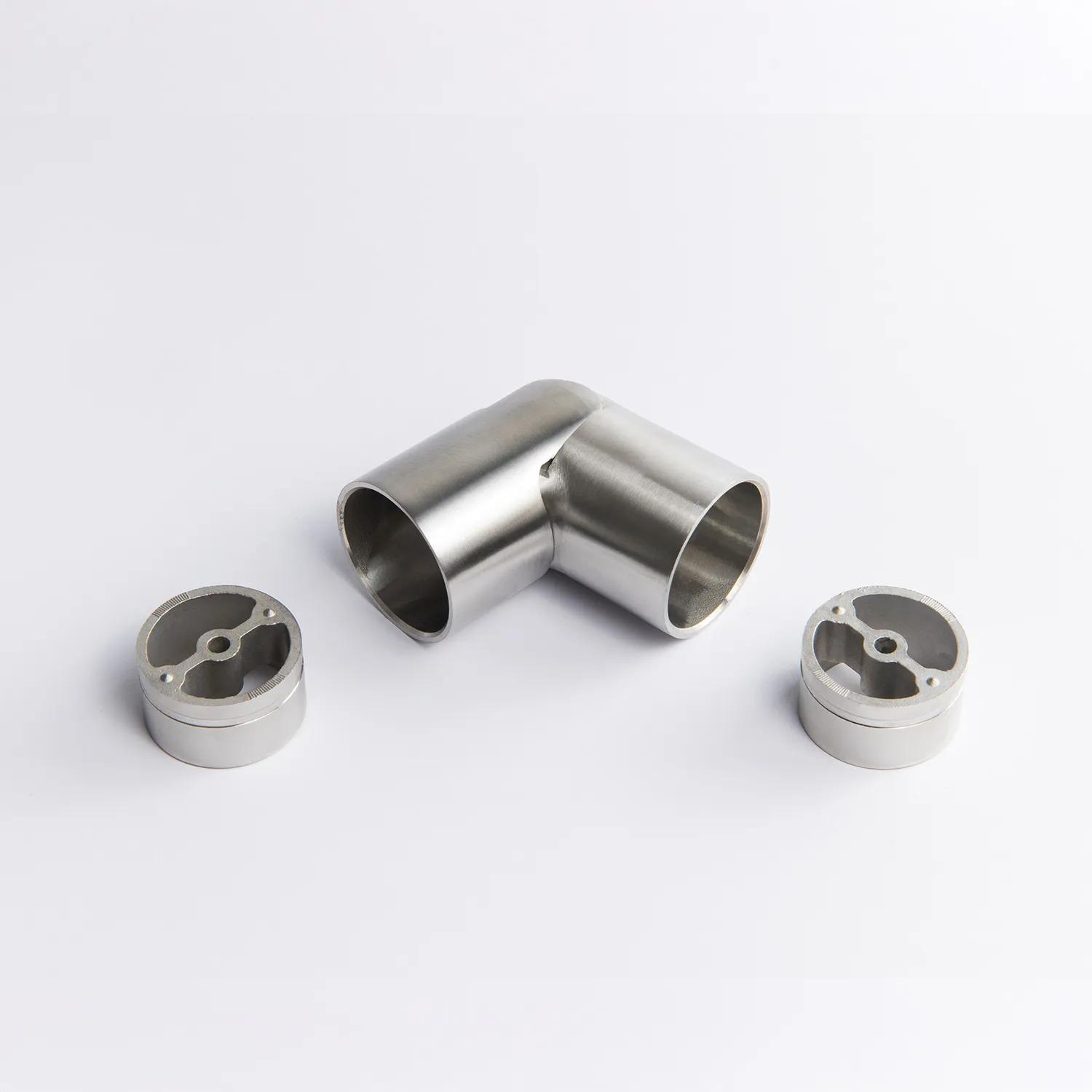 A flexible Stainless Steel metal tube connector positioned between two silver circular mounting inserts 43mm