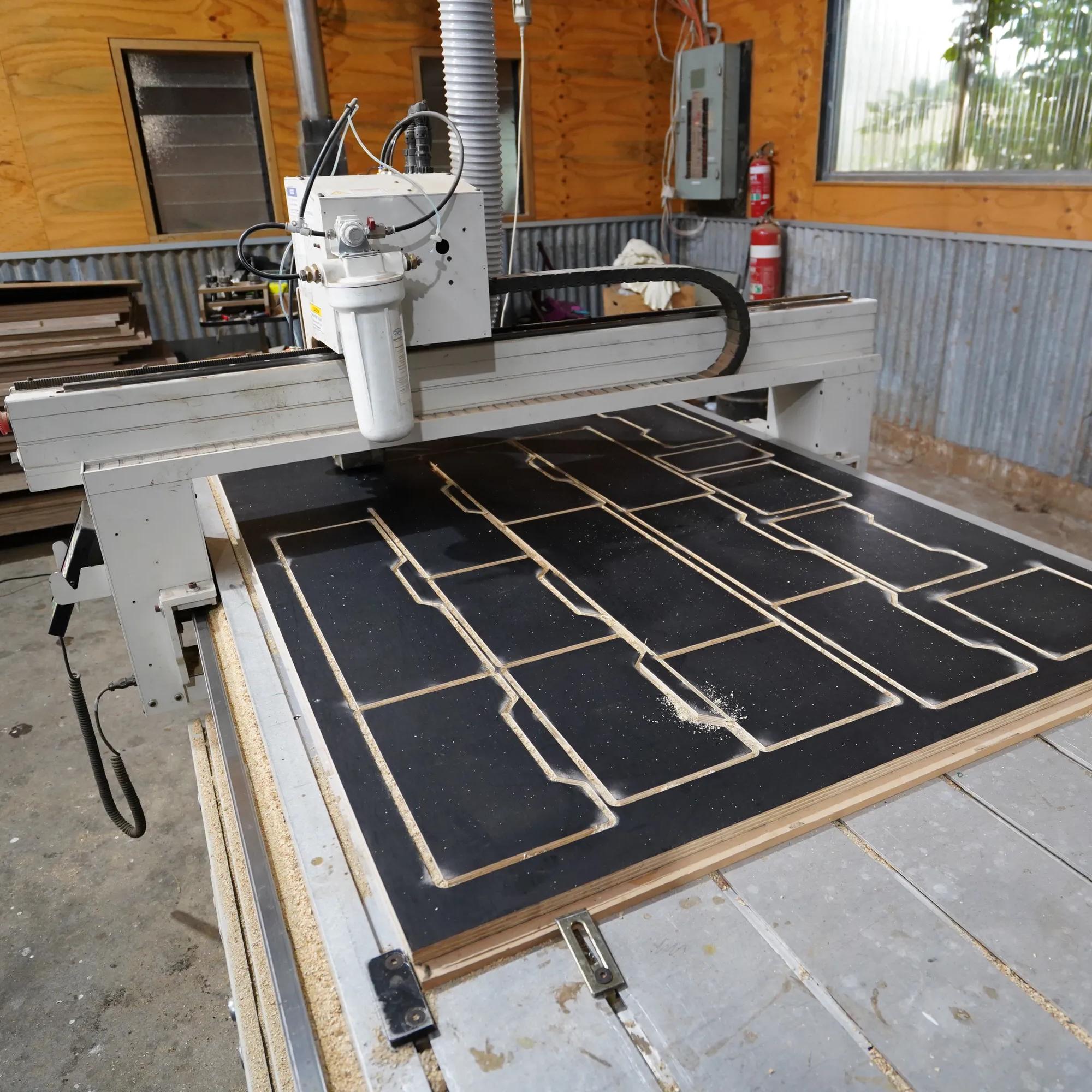 CNC router cutting STRUCTAply panels in a workshop