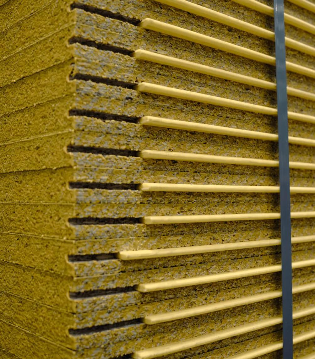 Wooden panels in a room with corrugated roofing