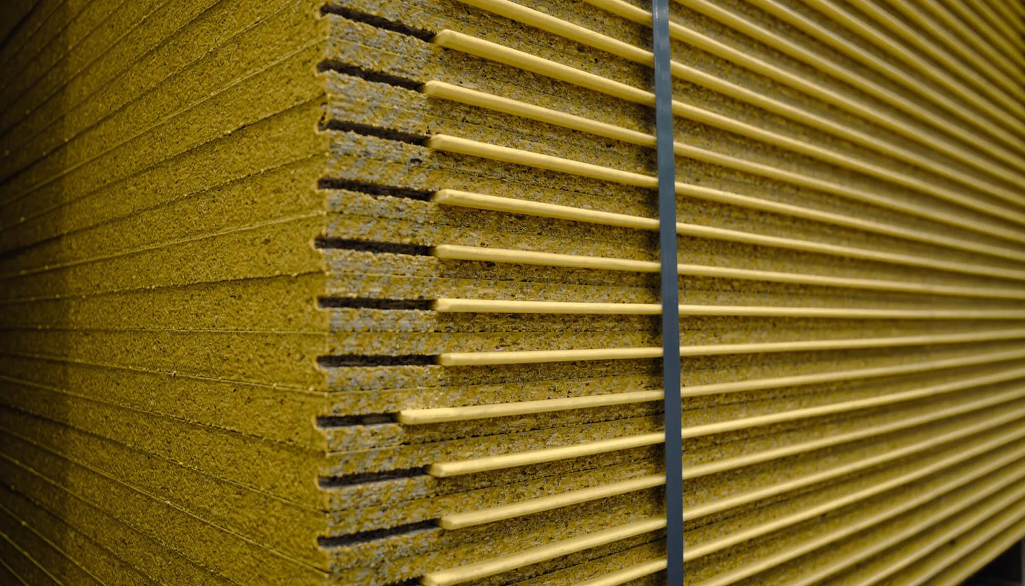 Wooden panels in a room with corrugated roofing