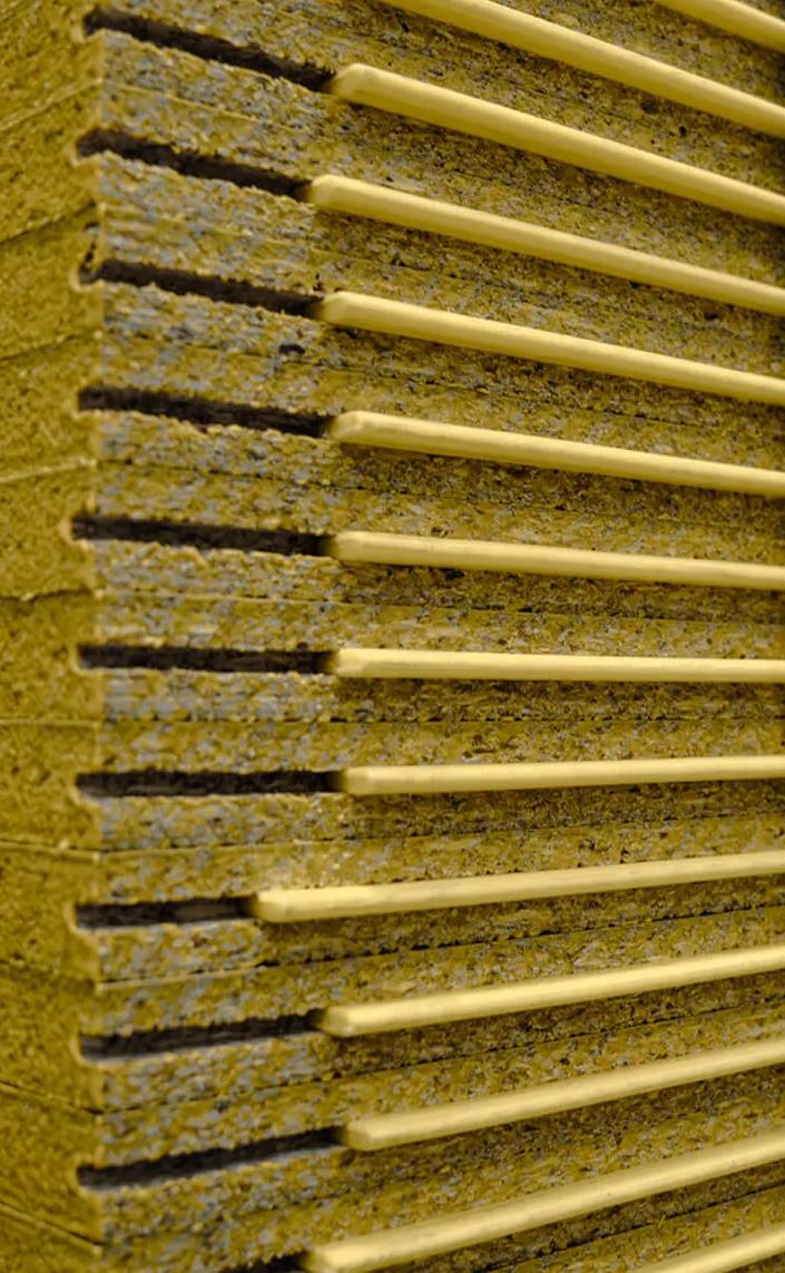 Wooden panels in a room with corrugated roofing