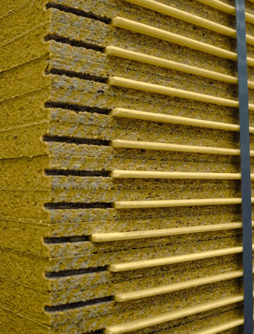 Wooden panels in a room with corrugated roofing