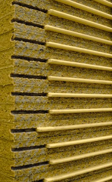 Wooden panels in a room with corrugated roofing
