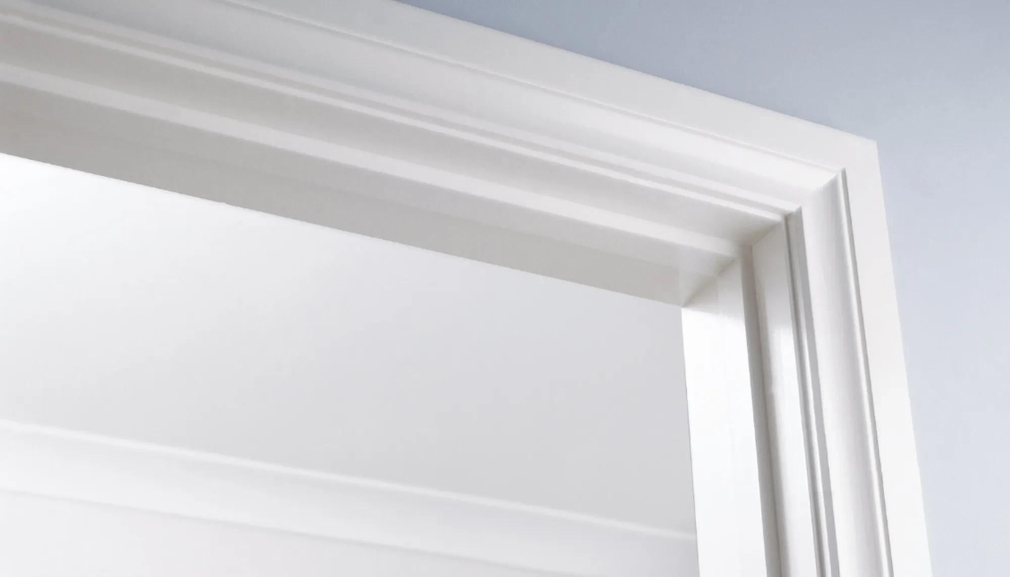 A closeup of installed Porta archtrave corner