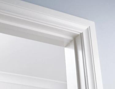A closeup of installed Porta archtrave corner