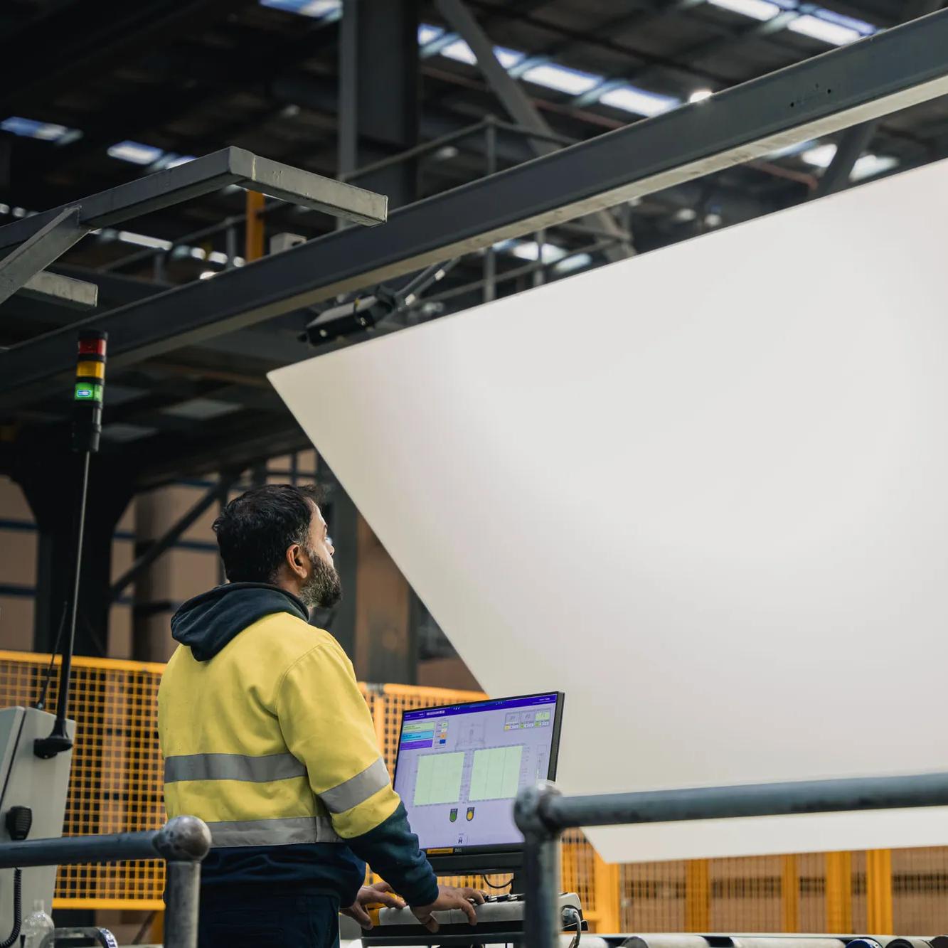 A person working in a factory environment