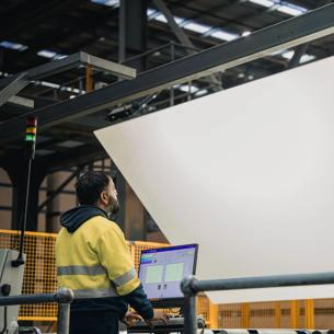 A person working in a factory environment