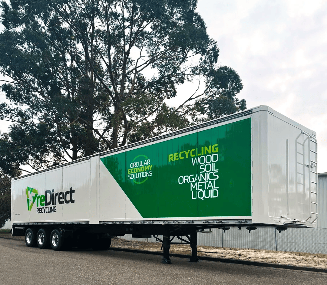 reDirect Recycling walking floor trailer with circular economy branding.