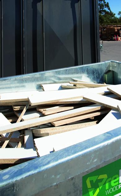 reDirect Wood Recycling skip bin filled with timber waste at site.