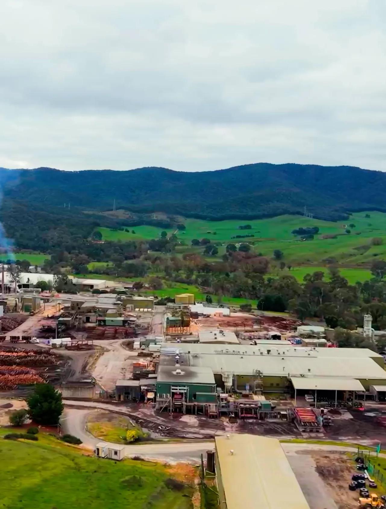 Aerial view of the STRUCTAply manufacturing facility in a green rural valley