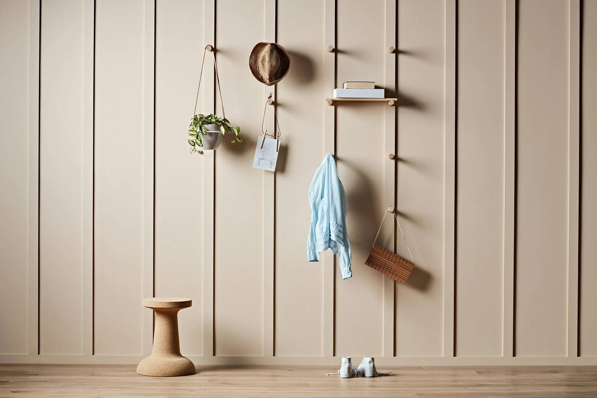 A styled wall made with Dressed board and dowels