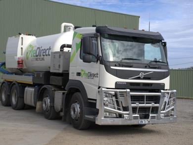 reDirect Liquid Recycling Volvo tanker truck front-angle view in open yard.