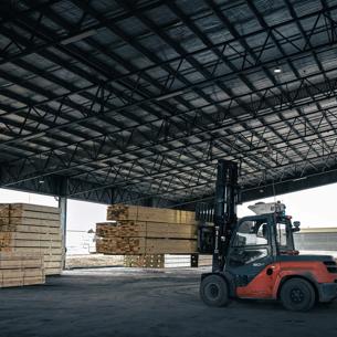 Large warehouse building with a forklift inside