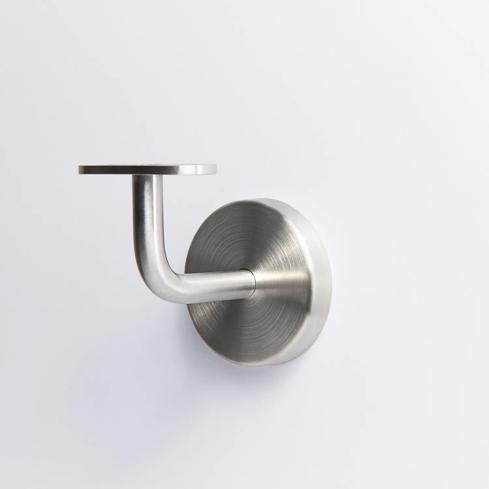 A handrail bracket with a round base plate, a curved support arm, and a flat mounting plate on top in Stainless Steel 70mm 43mm