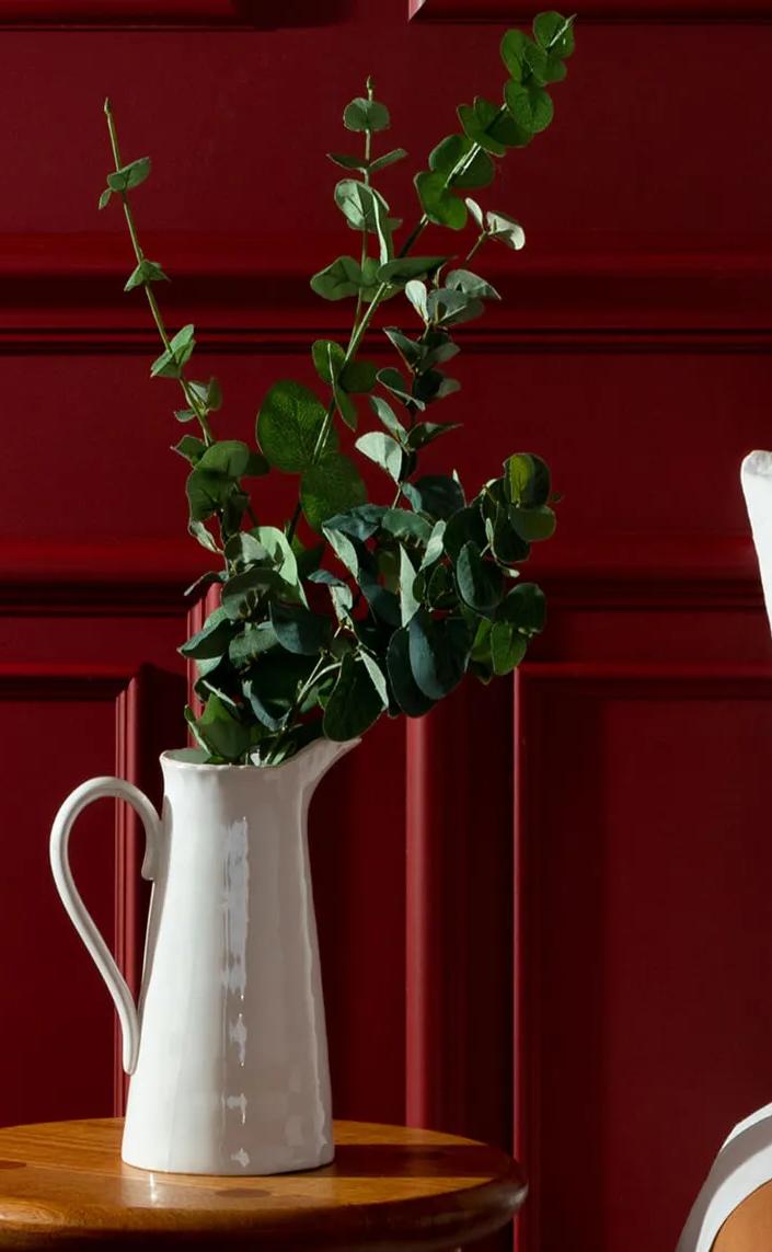 Red painted wooden paneling on wall