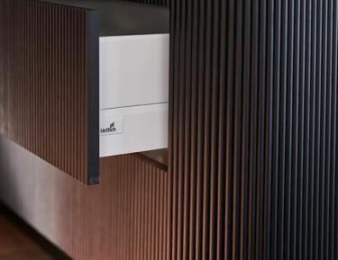 Black and brown striped wall behind counter