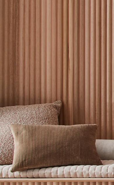 A long, brown wooden wall