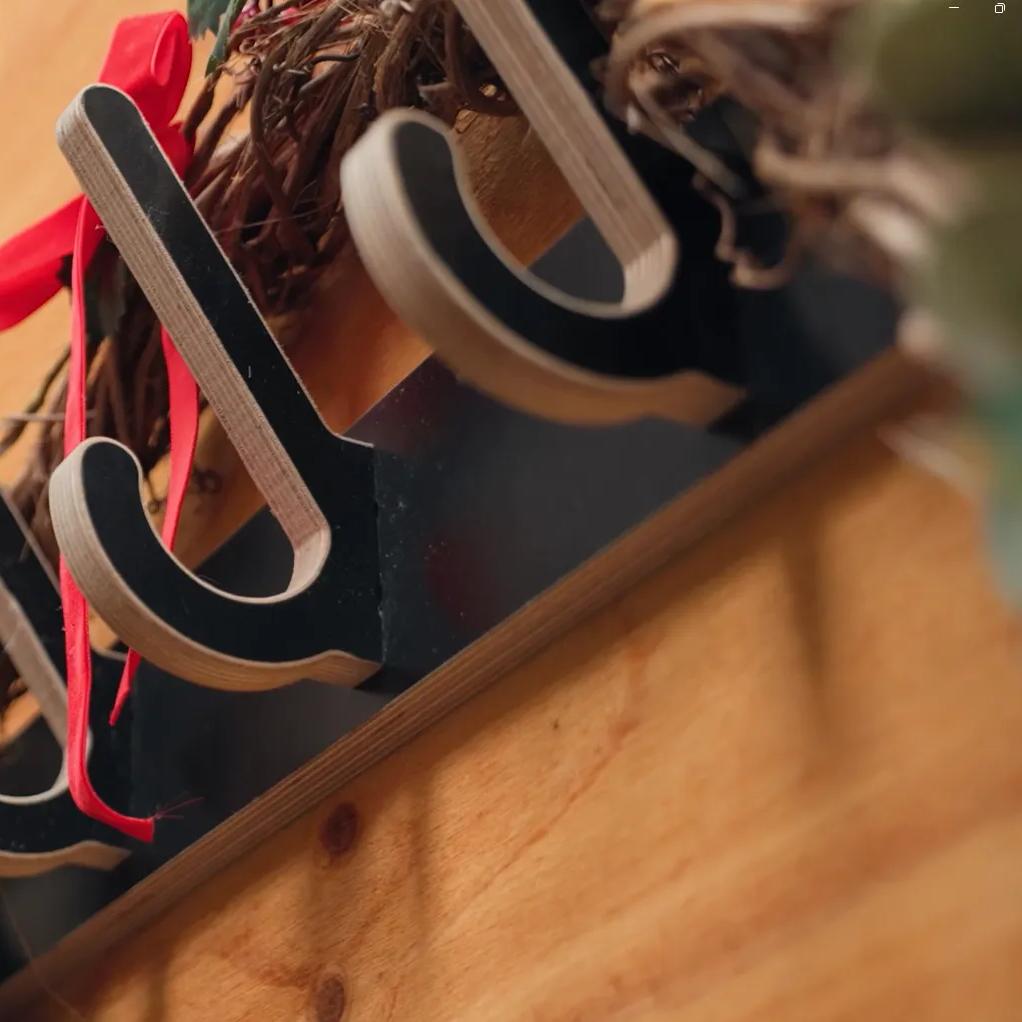 STRUCTAply timber panel used as a decorative wall-mounted Christmas wreath holder