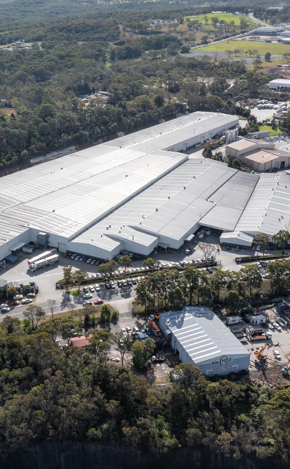 A sprawling industrial building in an Australian setting