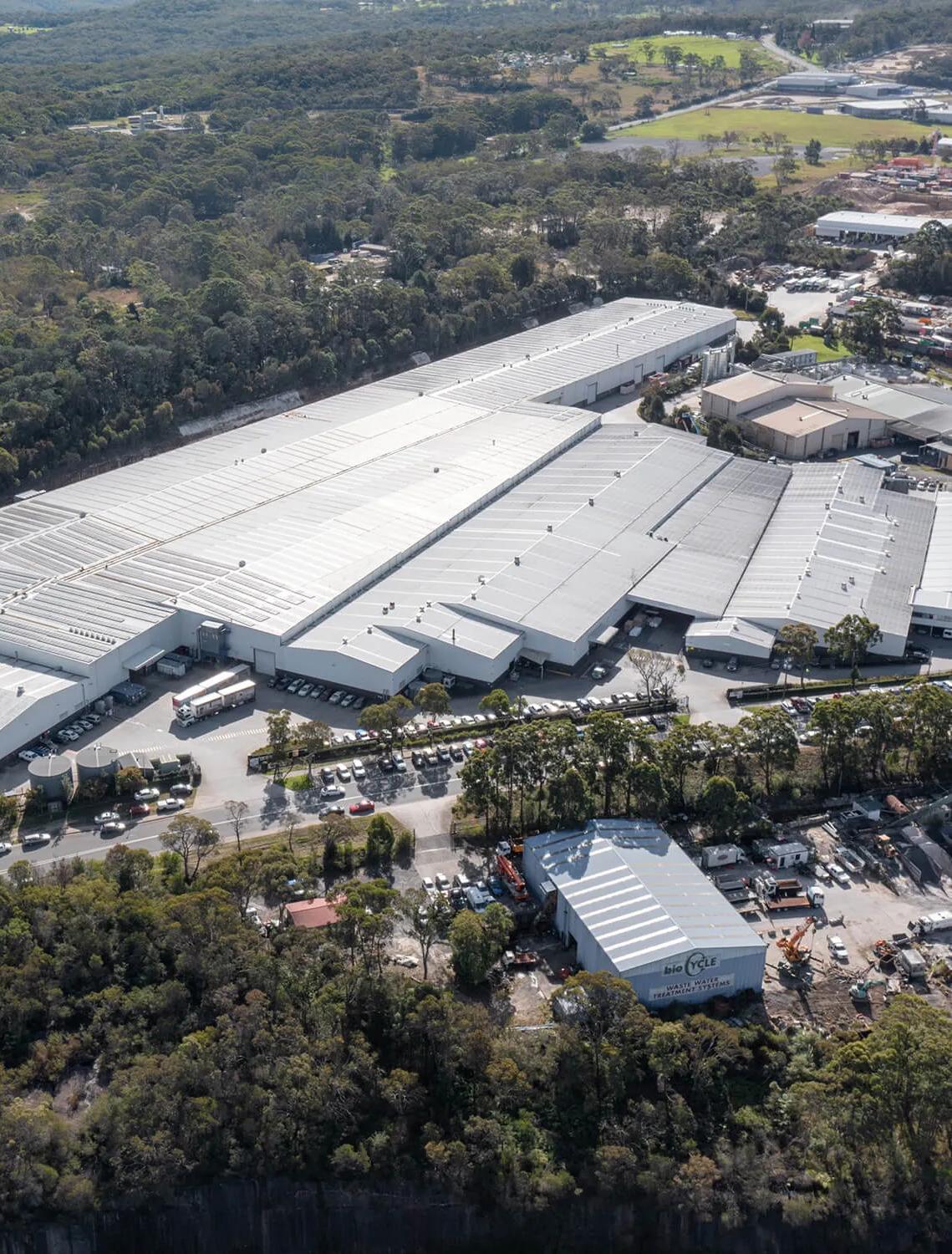 A sprawling industrial building in an Australian setting