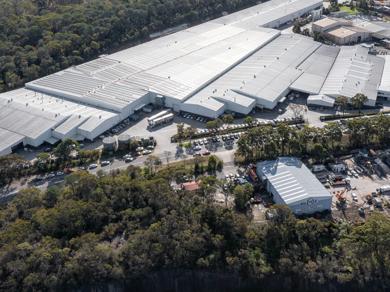 A sprawling industrial building in an Australian setting