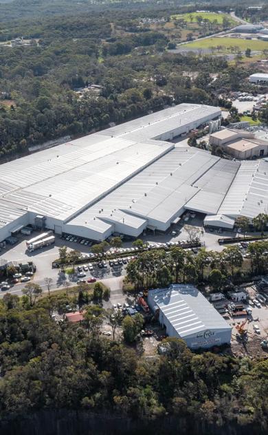 A sprawling industrial building in an Australian setting