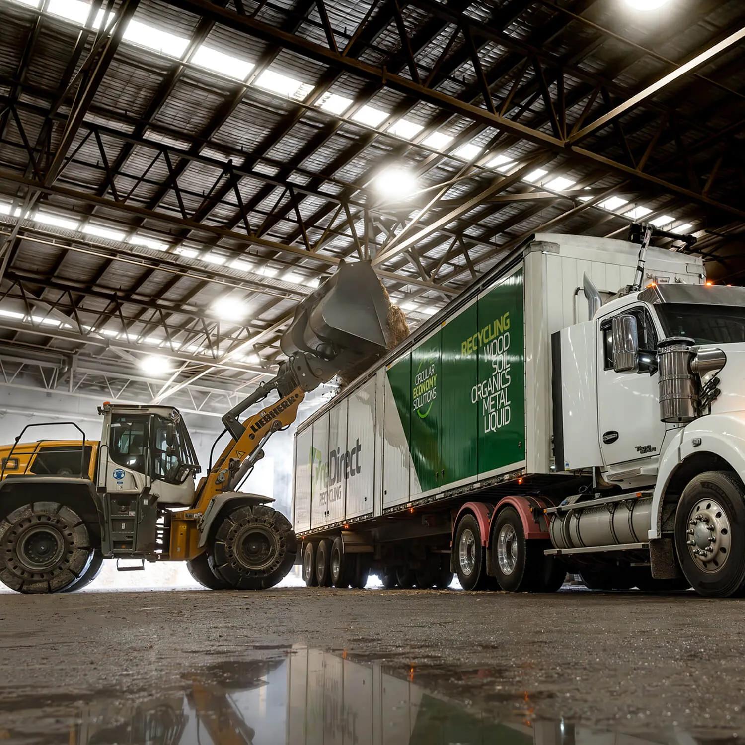Vehicles inside a warehouse at night