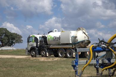 reDirect Liquid Recycling tanker truck operating in rural paddock.