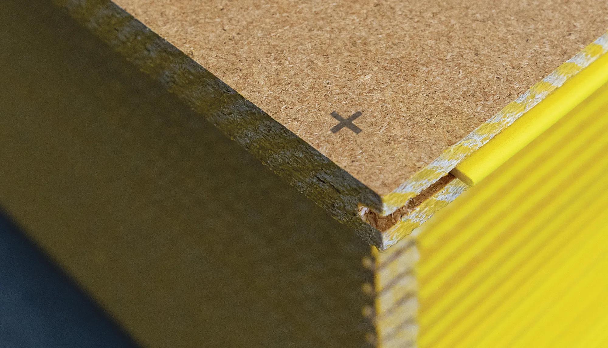 Yellow tongue marking on a STRUCTAflor panel