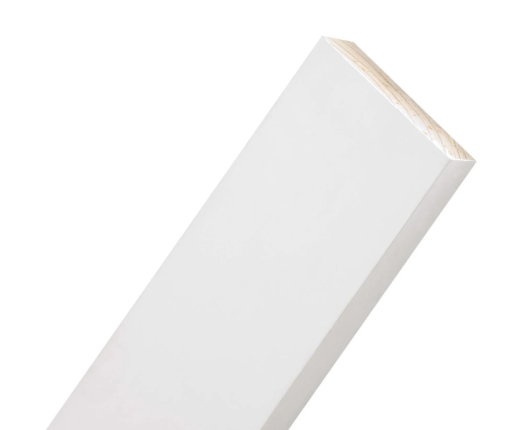 Close-up of a primed pine timber board angled against a white background
