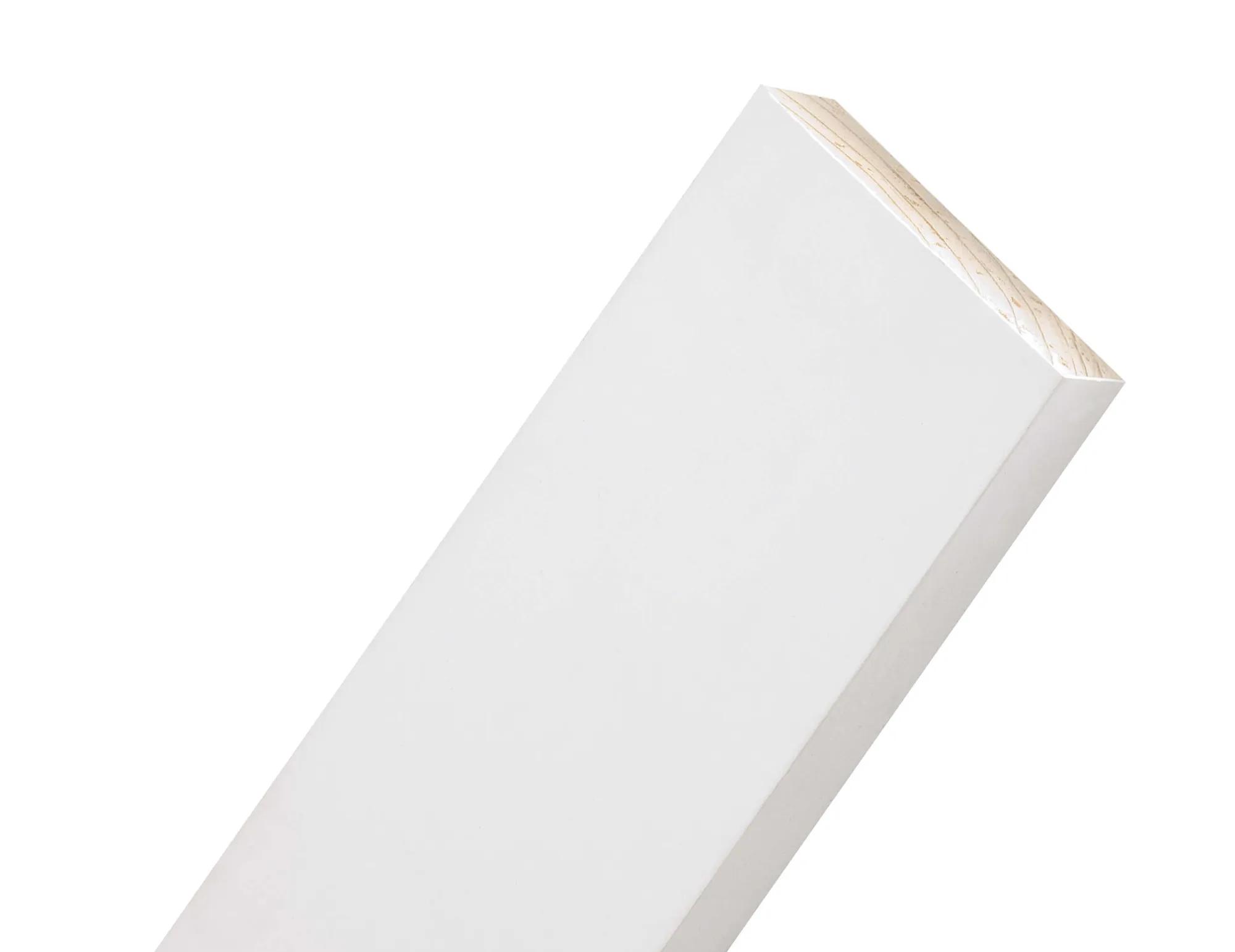 Close-up of a primed pine timber board angled against a white background