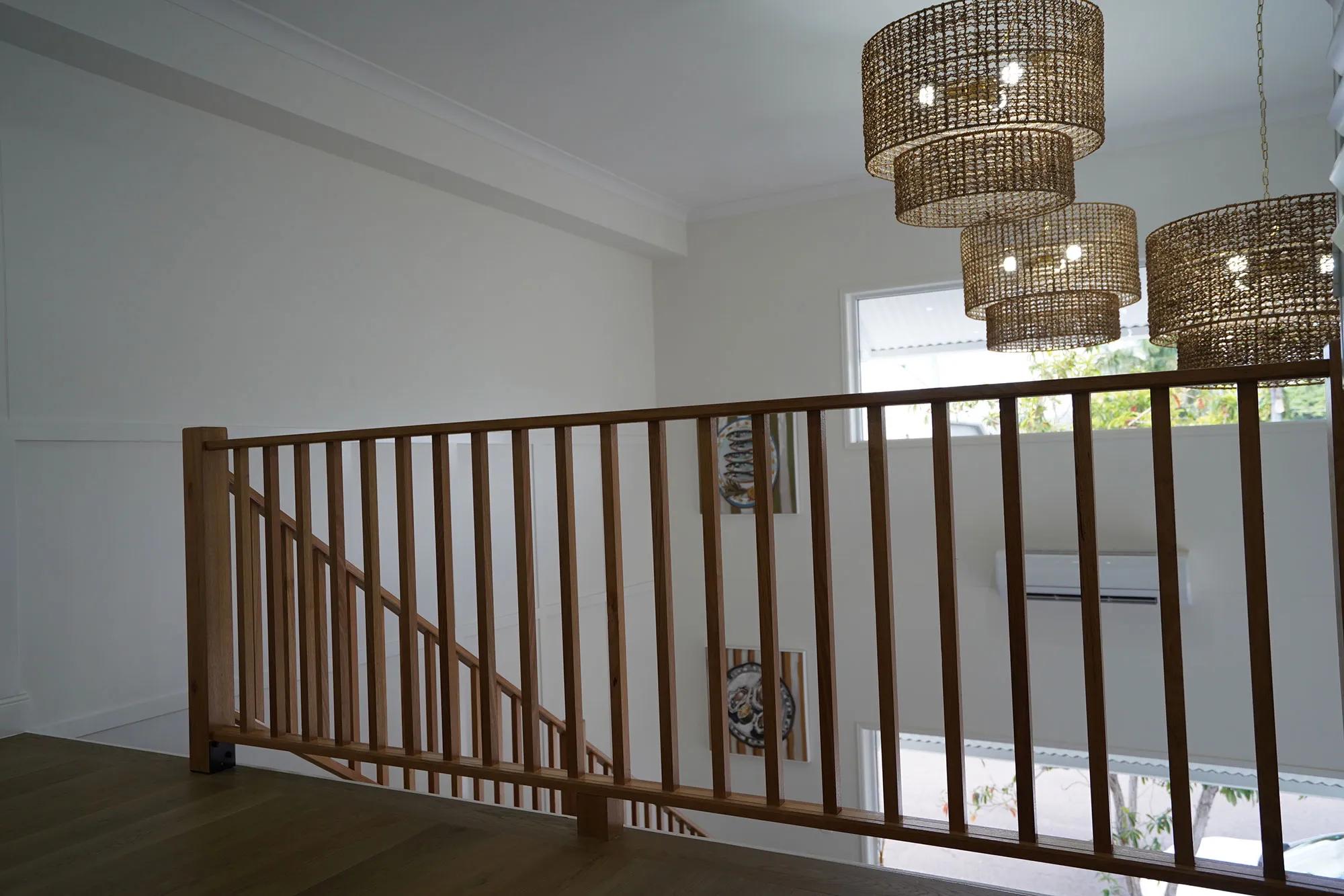 This is a staircase with wooden railings