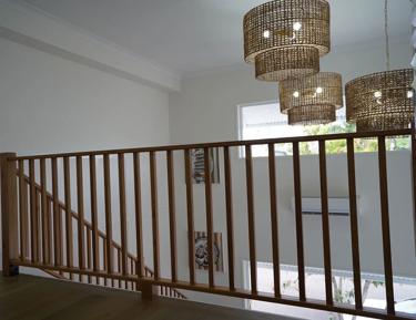 This is a staircase with wooden railings
