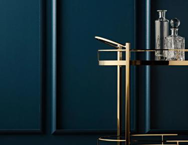 Modern bar cart in a dark room