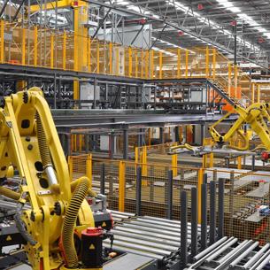 Modern factory with machinery on assembly line