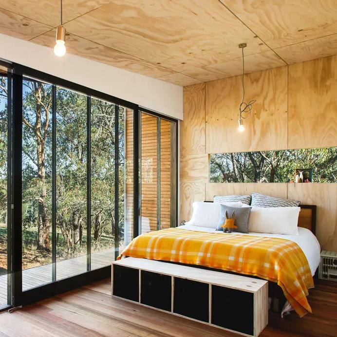 A bedroom with STRUCTAply used for the walls and floor
