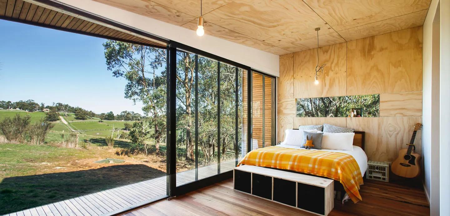 A bedroom with STRUCTAply used for the walls and floor