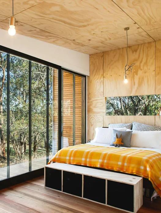 A bedroom with STRUCTAply used for the walls and floor
