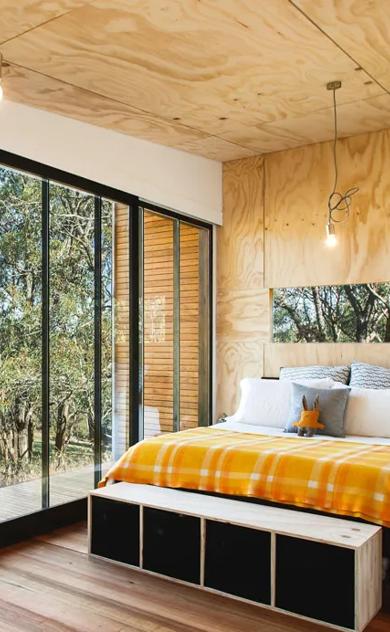 A bedroom with STRUCTAply used for the walls and floor